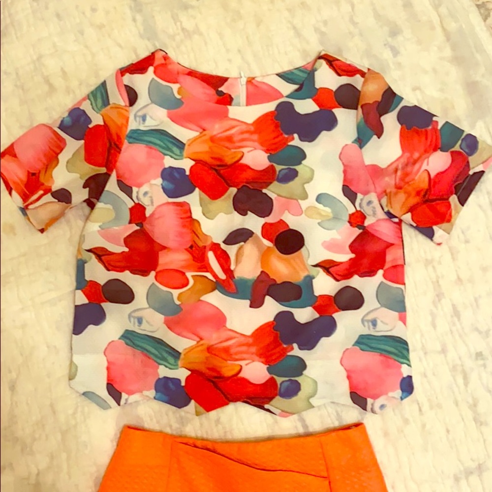 Bright shirt with scalloped hem!